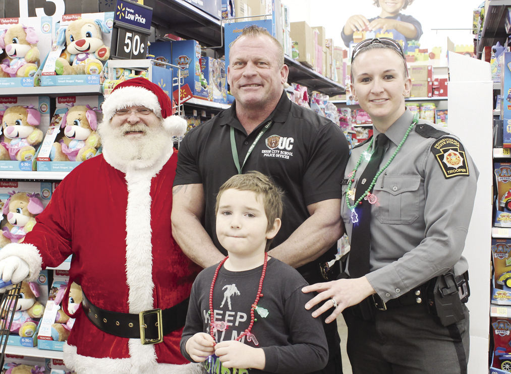 Edward Schick, Cindy Schick, Carter Miller, Santa